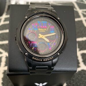 **Clearance**
Vintage Baby G-Shock (Black/Multi- Colored Face)